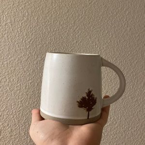 Hearth and Hand ceramic mug with a tree painted on it!